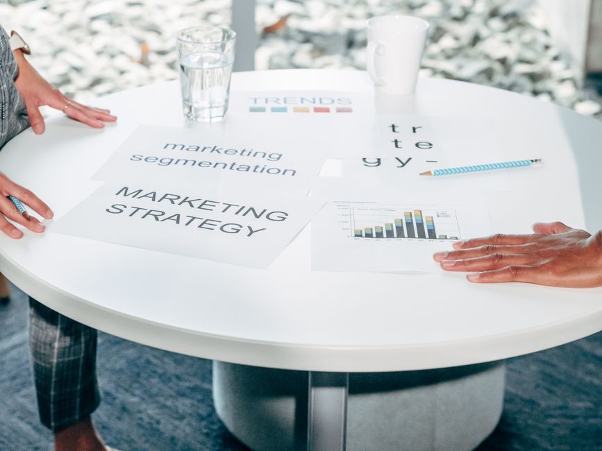 Marketing team planning an AI search strategy in a meeting