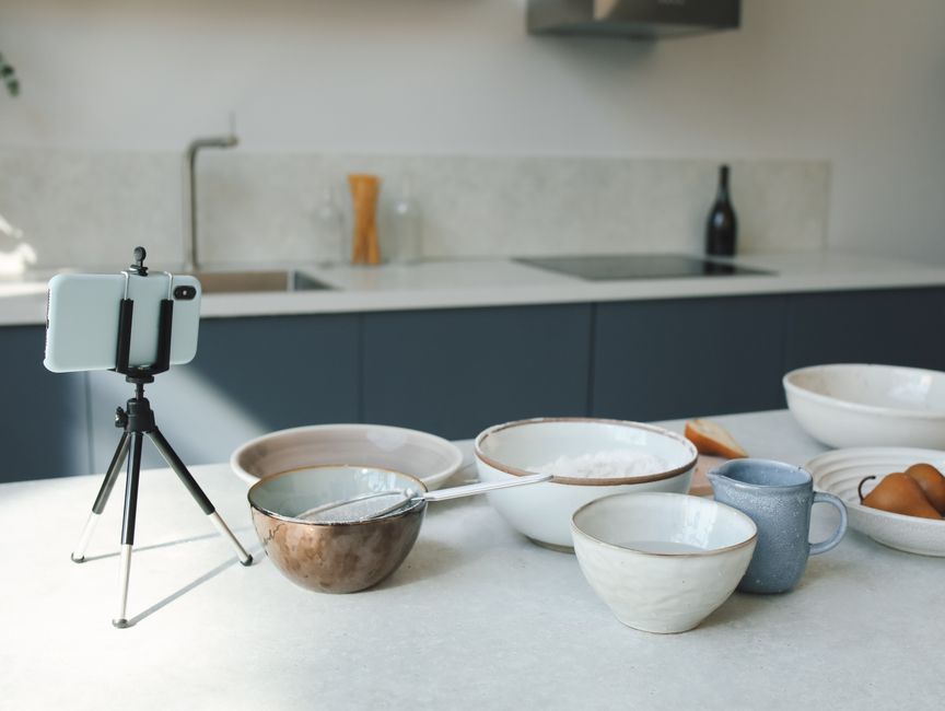 Smartphone on a tripod set up to film product content for social media