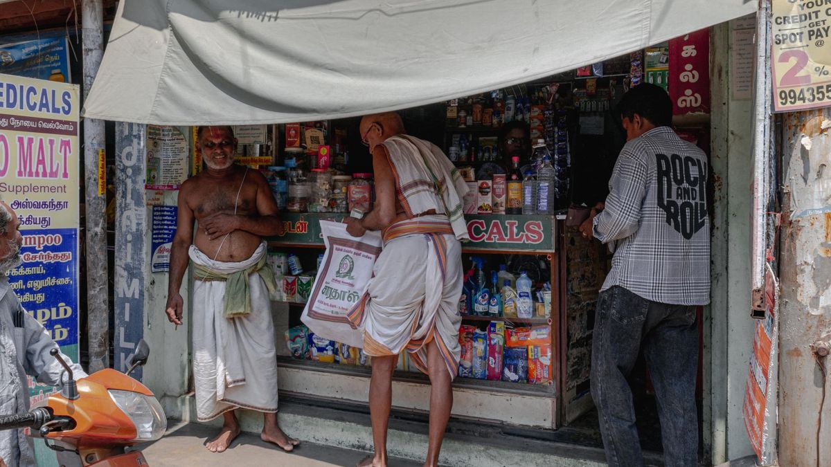 Customers shopping at a neighbourhood store in India