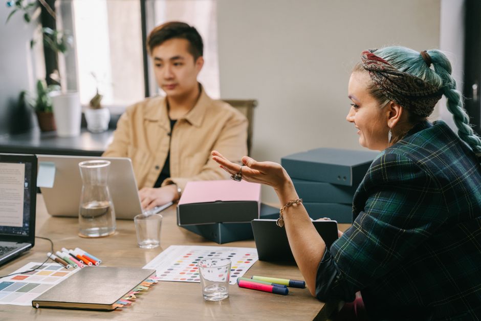 Team collaborating in a branding agency office on strategy documents
