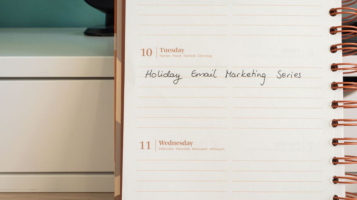 Planner page with a handwritten Holiday Email Marketing Series note for campaign scheduling