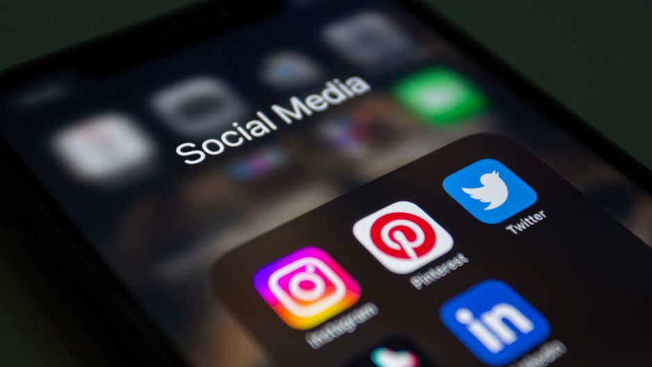 Smartphone showing social media feed used for Facebook and Instagram advertising in the UAE
