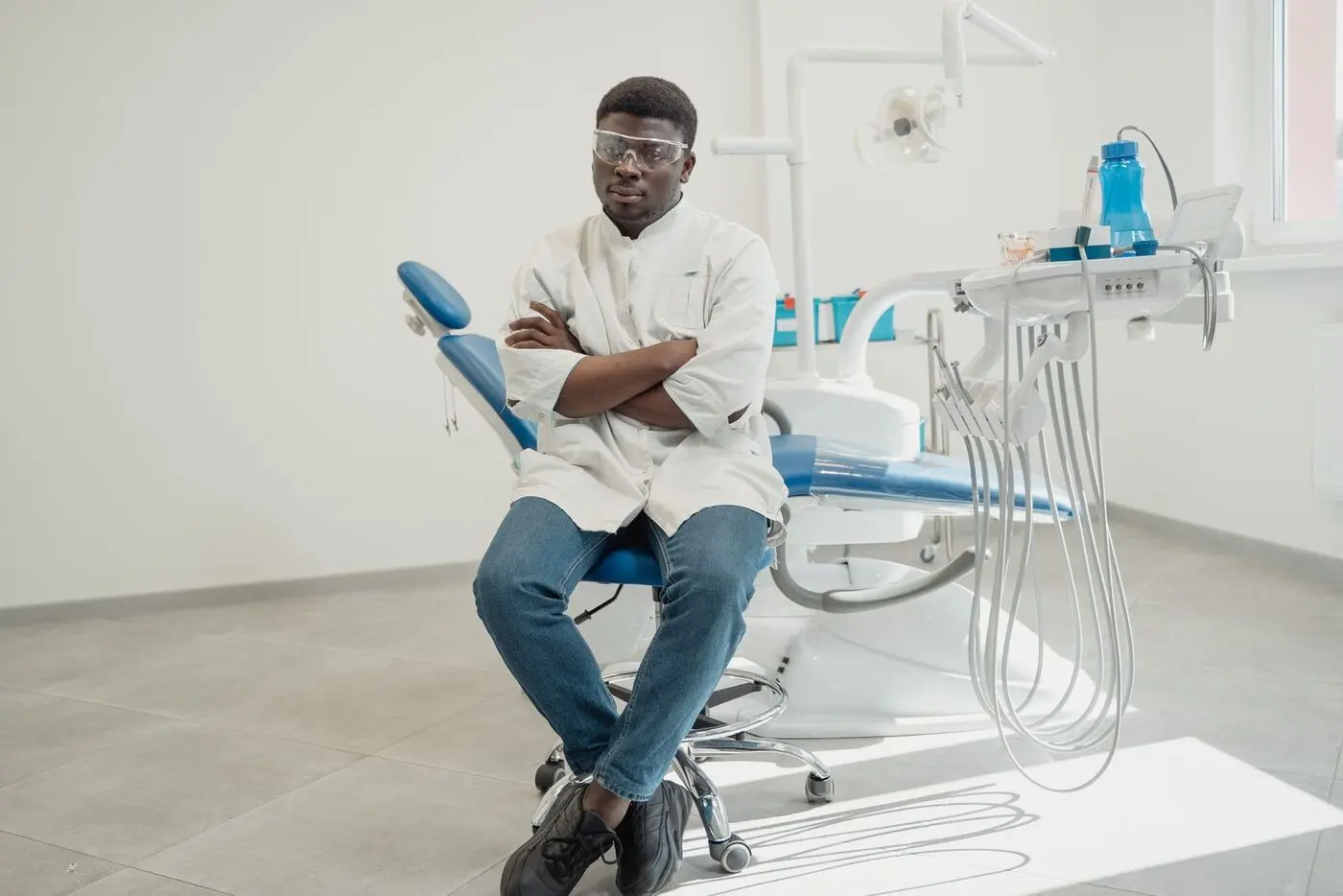 Clinician seated in a bright treatment room